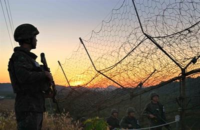 South Korea's military fires warning shots at North Korean soldiers as they cross military demarcation line