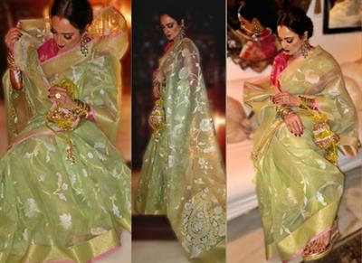 Rekha exudes timeless elegance in a handwoven Banarasi Kora silk saree