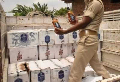 Delhi Police seize 44 cartons of illicit liquor, vehicle