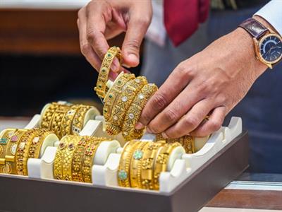 Gold, silver prices decline as stronger dollar weighs on demand